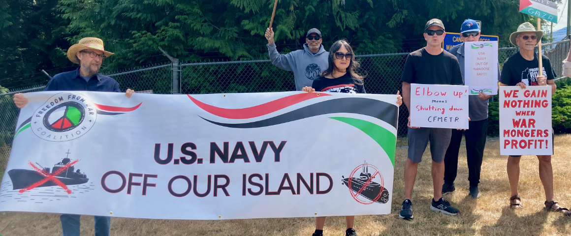 Protests greet Carney’s tour of Nanoose Bay torpedo test range